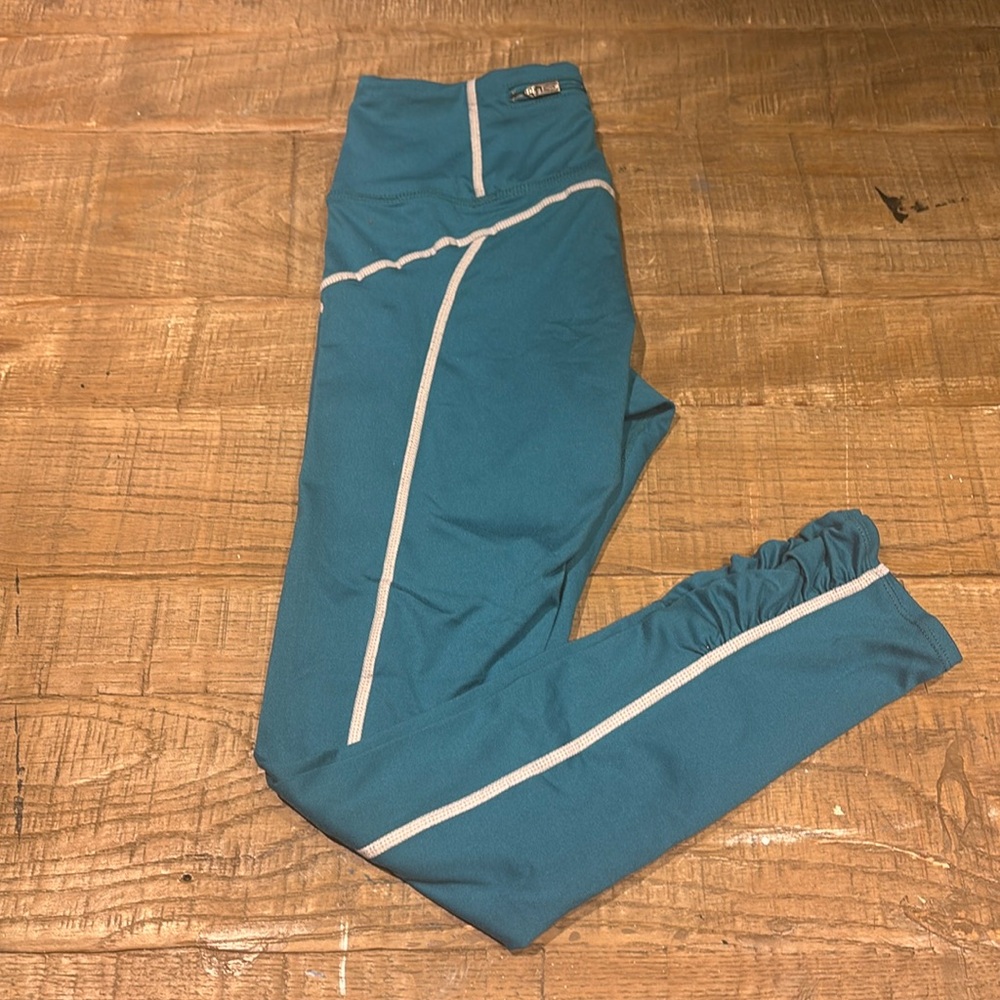 NWOT fp movement teal and silver stripped leggings